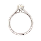 Diamond ring with a white gemstone on a white background