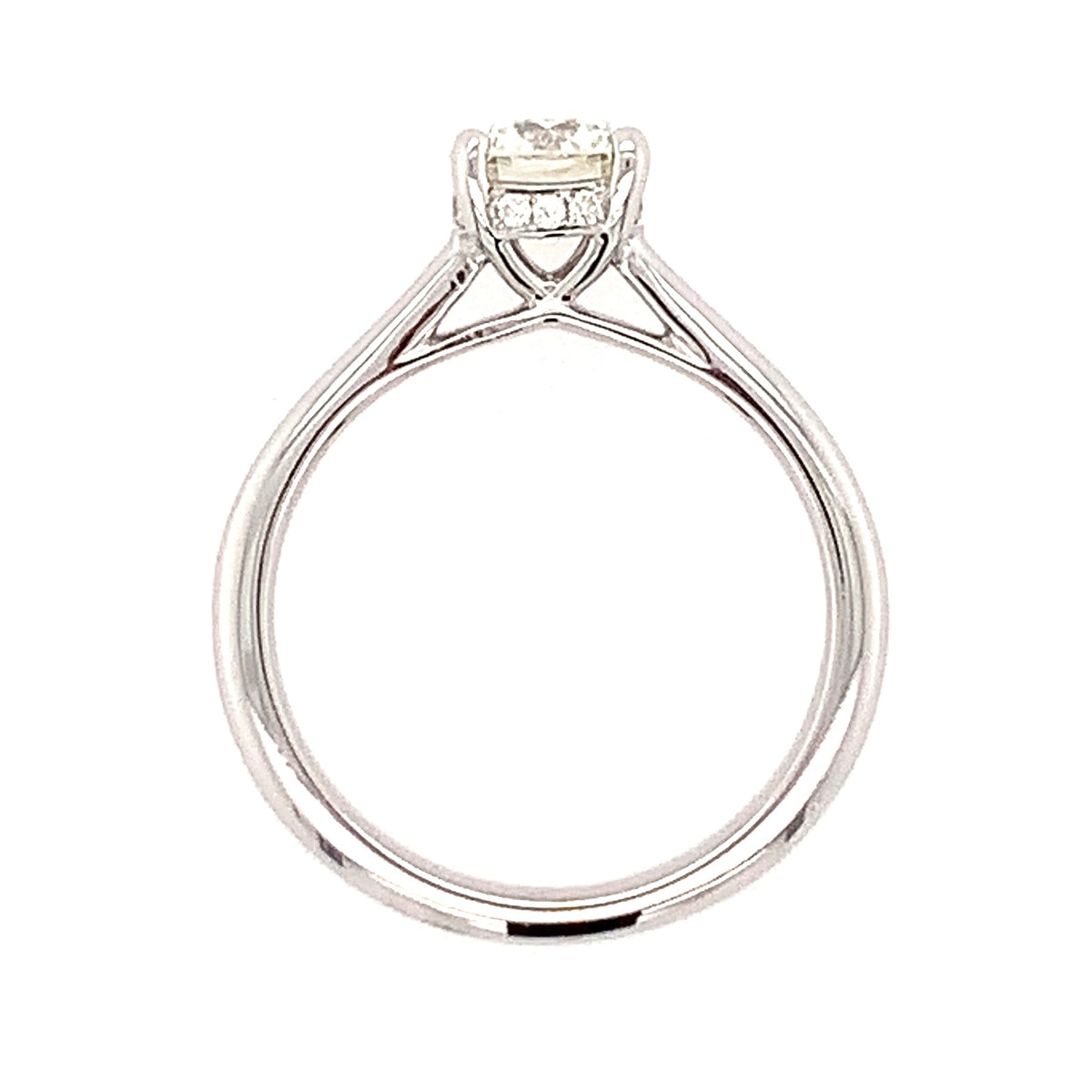 Diamond ring with a white gemstone on a white background