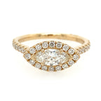 Gold ring with a central diamond and smaller diamonds on a white background
