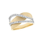 A two-tone ring featuring a matte yellow gold band interlaced with a silver-toned band paved with small clear stones, shown on a plain white background.