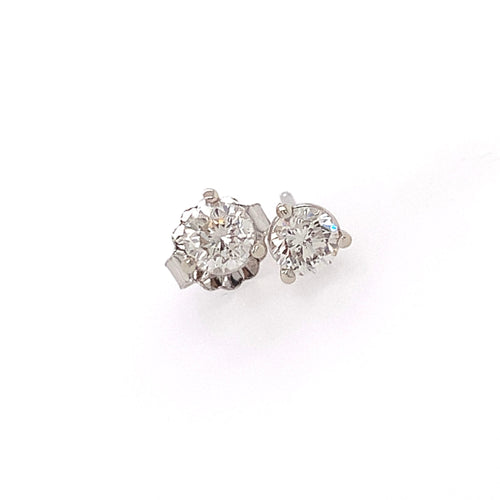 Diamond stud earrings on a white background