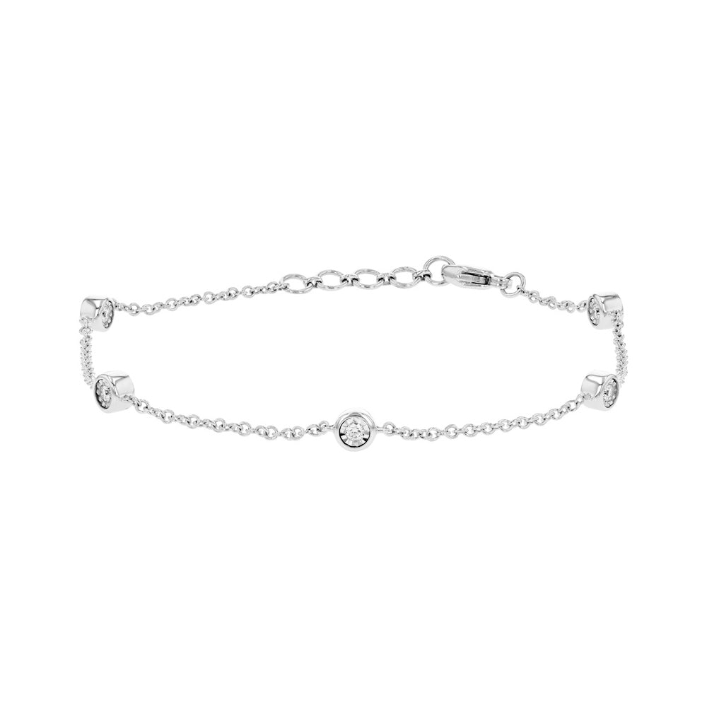 A delicate silver chain bracelet featuring three small bezel-set round clear stones, displayed against a solid white background.