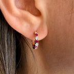Ruby & Diamond Huggie Hoop Earrings by Spark Creations, Inc., SKU 210-00424, view 2 — Moses Jewelers