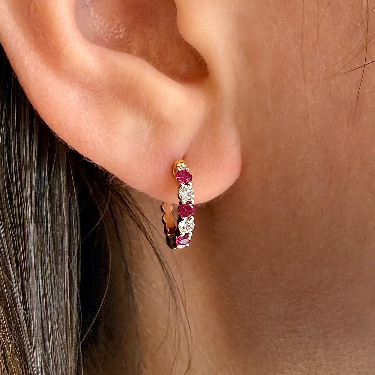 Ruby & Diamond Huggie Hoop Earrings by Spark Creations, Inc., SKU 210-00424, view 2 — Moses Jewelers