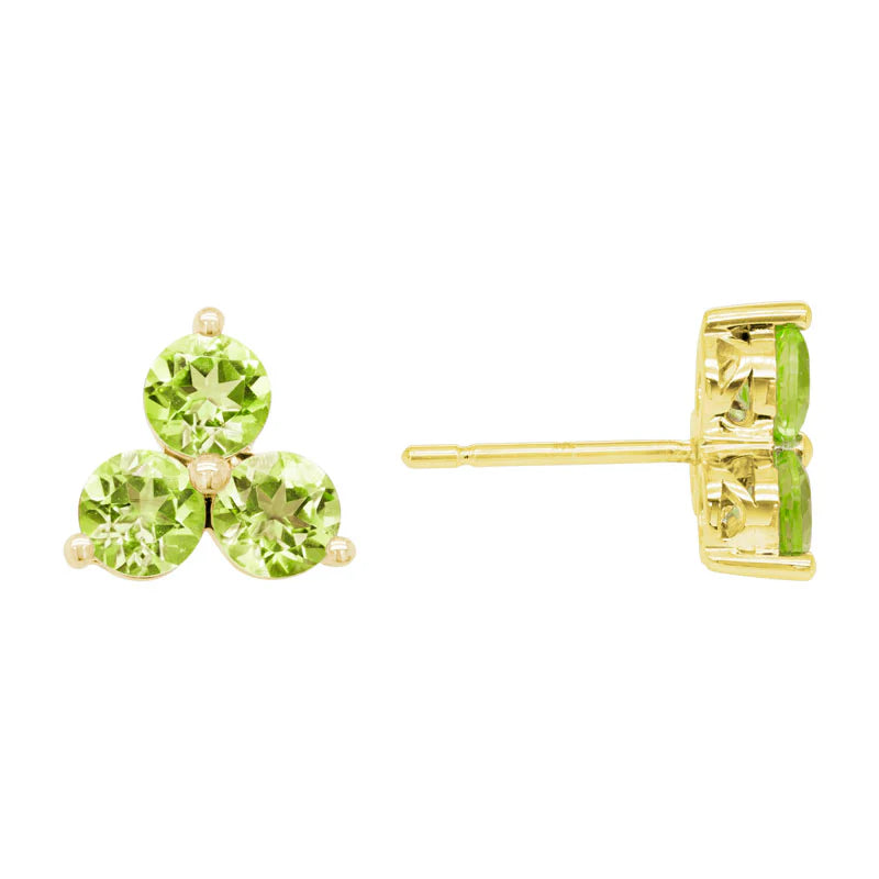 Pair of green gemstone earrings on a white background