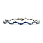Blue Sapphire Wave Bracelet by Michael Couch & Associates, SKU 240-00053, main view — Moses Jewelers
