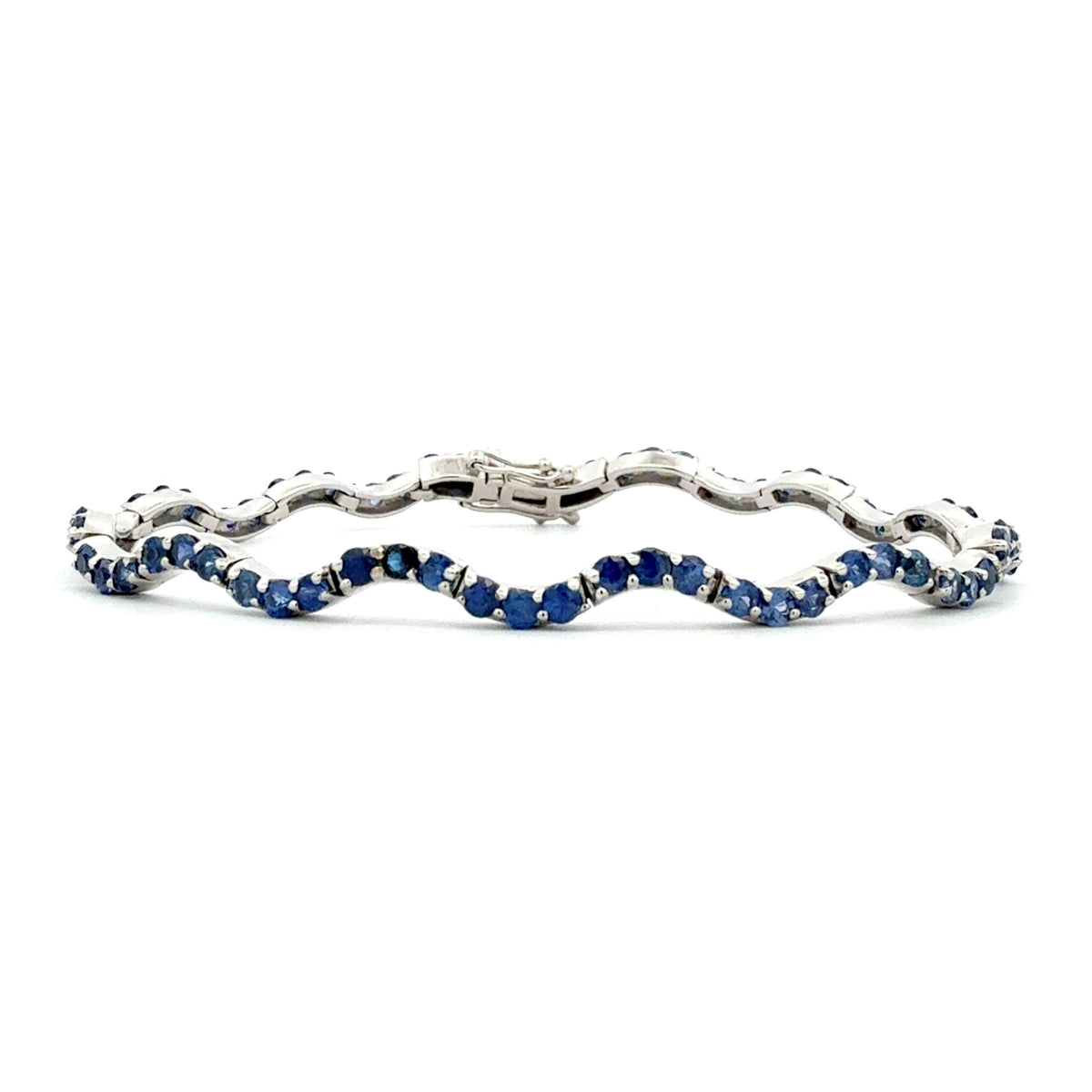 Blue Sapphire Wave Bracelet by Michael Couch & Associates, SKU 240-00053, main view — Moses Jewelers