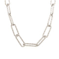 Sterling silver textured paperclip chain necklace with elongated oval links on a white background