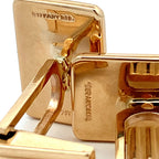 Gold Tiffany & Co. lock on a white background