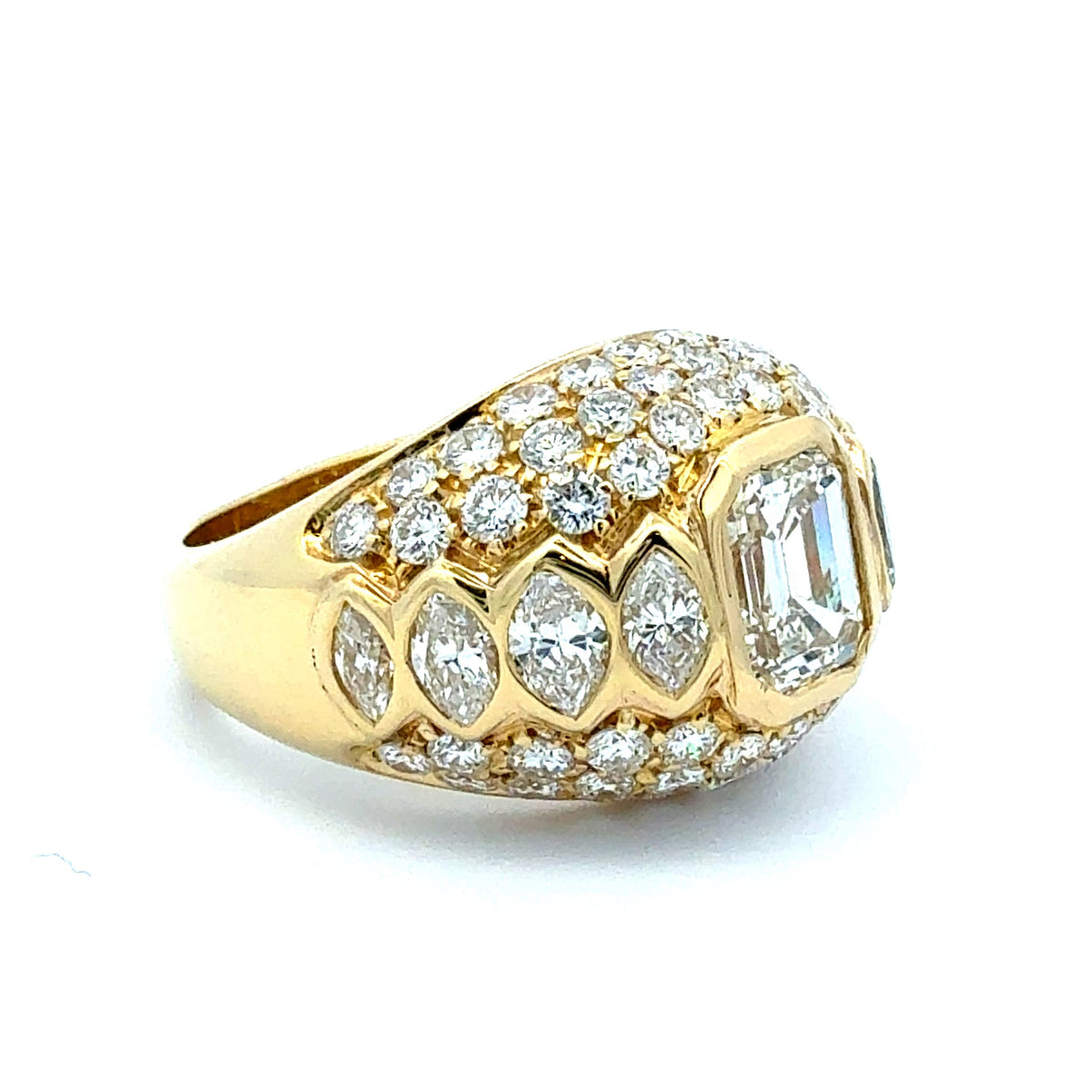 Gold ring with diamond accents on a white background