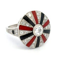 Elegant ring with red, black, and white design on a white background