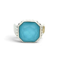 A silver-toned octagonal signet ring featuring a large, faceted light blue turquoise center stone, accented with small clear stones along the shoulders and a small gold-toned detail on the band, set against a plain white background.