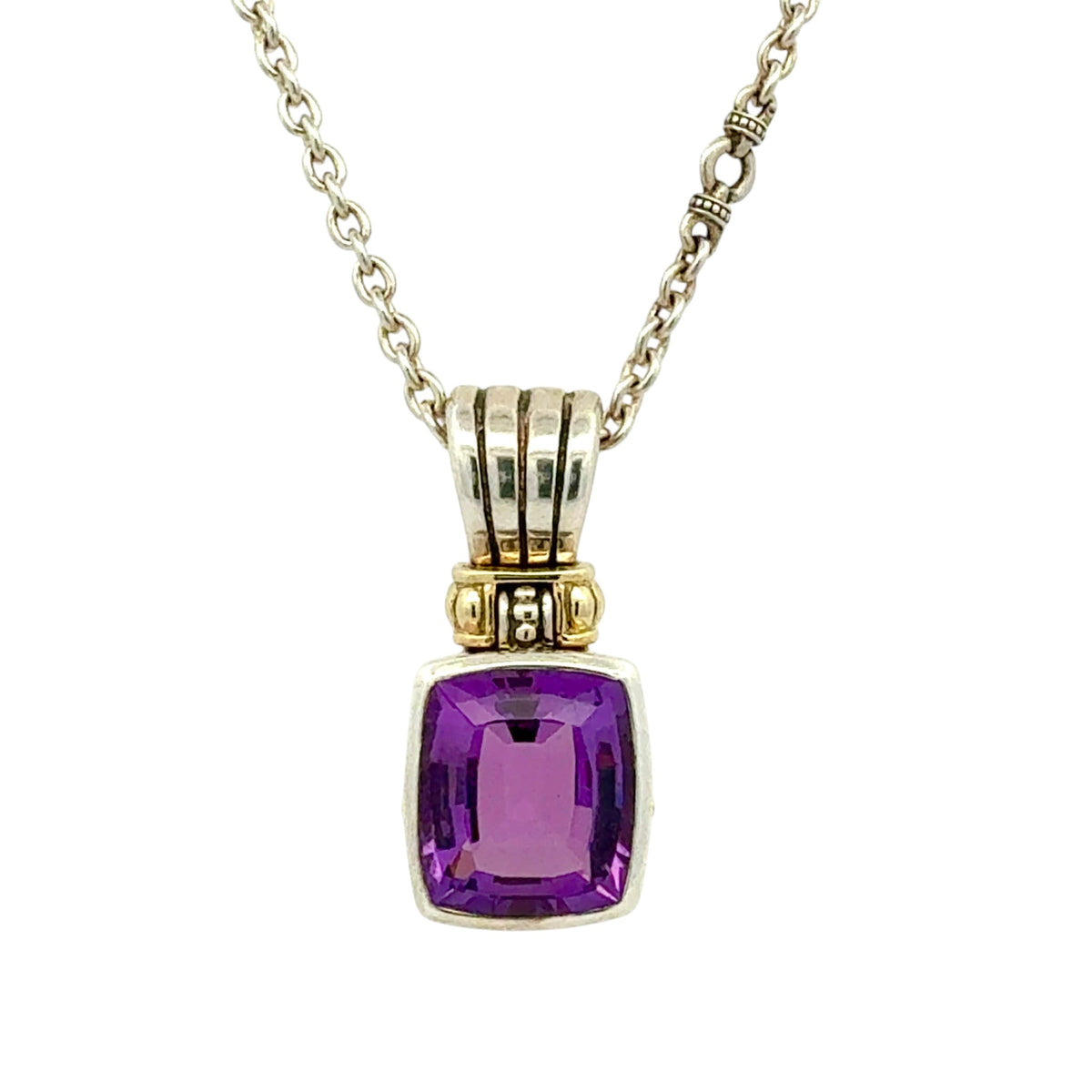A silver and gold pendant necklace featuring a cushion-cut purple amethyst gemstone, shown against a plain white background.