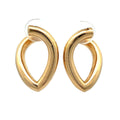 A pair of gold-toned open teardrop hoop earrings with a polished finish, displayed on a clean white background.