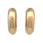 A pair of polished yellow gold hoop earrings with a smooth, rounded, elongated oval shape, shown against a plain white background.
