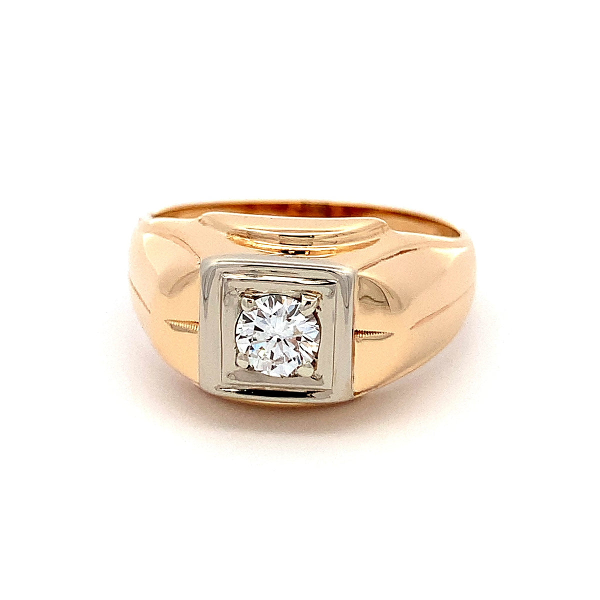 A men's signet ring featuring a square-cut diamond set in a two-tone gold and white gold or platinum bezel, mounted on a polished yellow gold band.