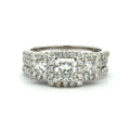 Diamond ring with multiple stones on a white background