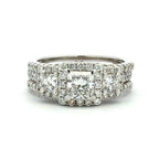 Diamond ring with multiple stones on a white background