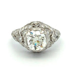 Diamond ring with intricate design on a white background