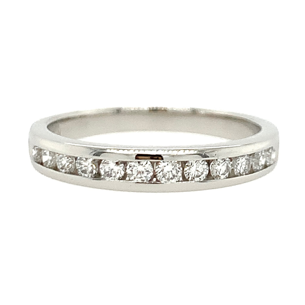 Silver ring with small diamonds on a white background