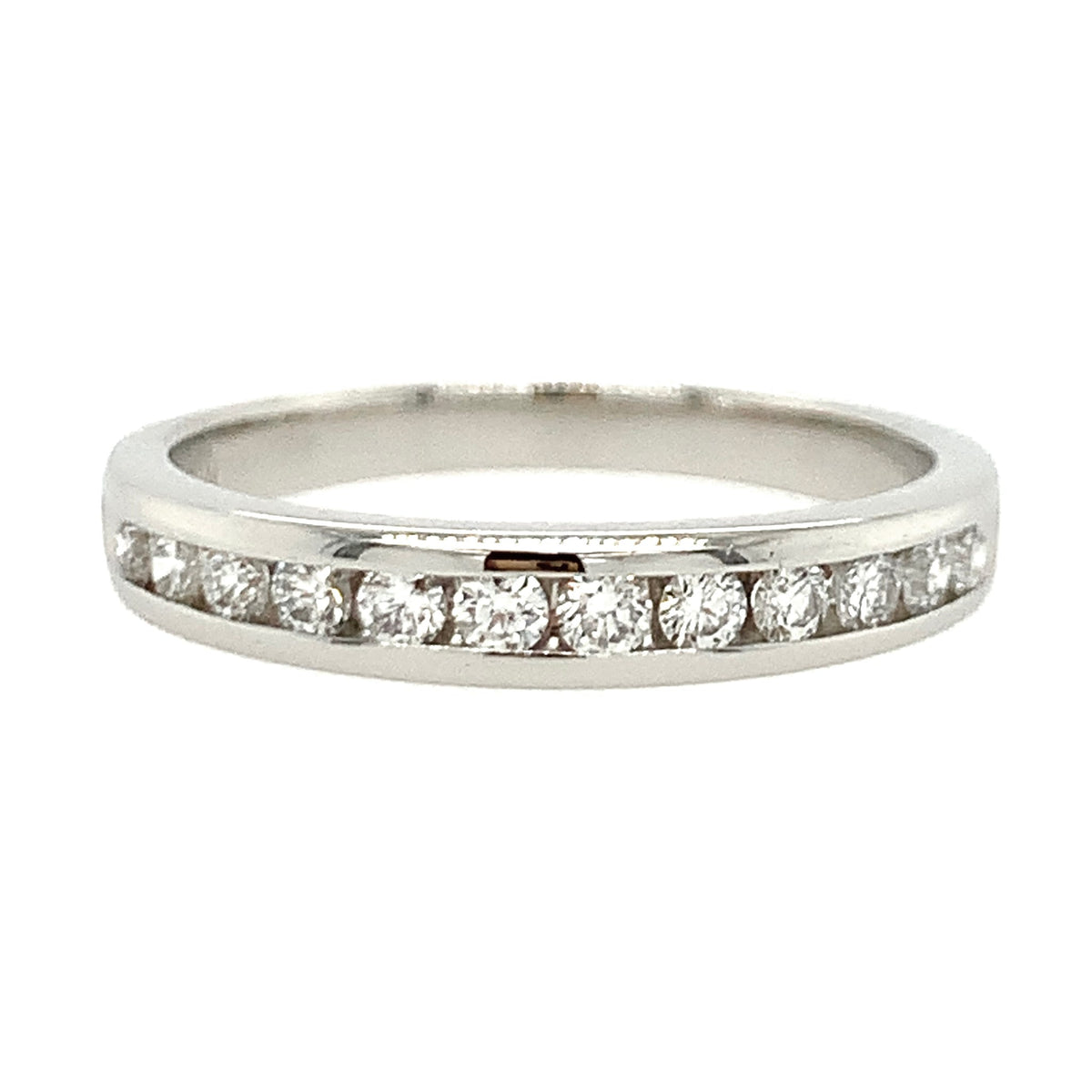 Silver ring with small diamonds on a white background
