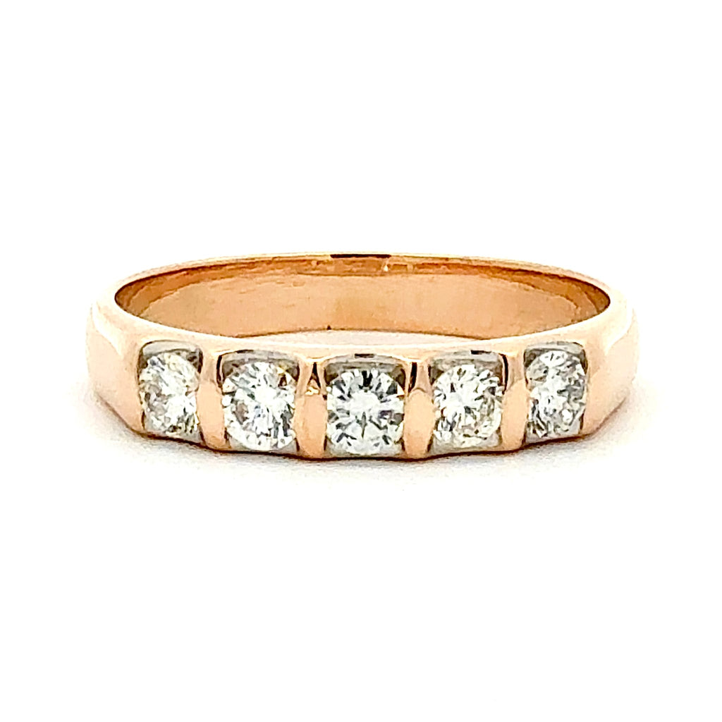 Rose gold ring with diamonds on a white background