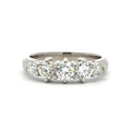 Diamond ring with five stones on a white background