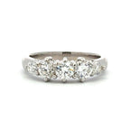 Diamond ring with five stones on a white background