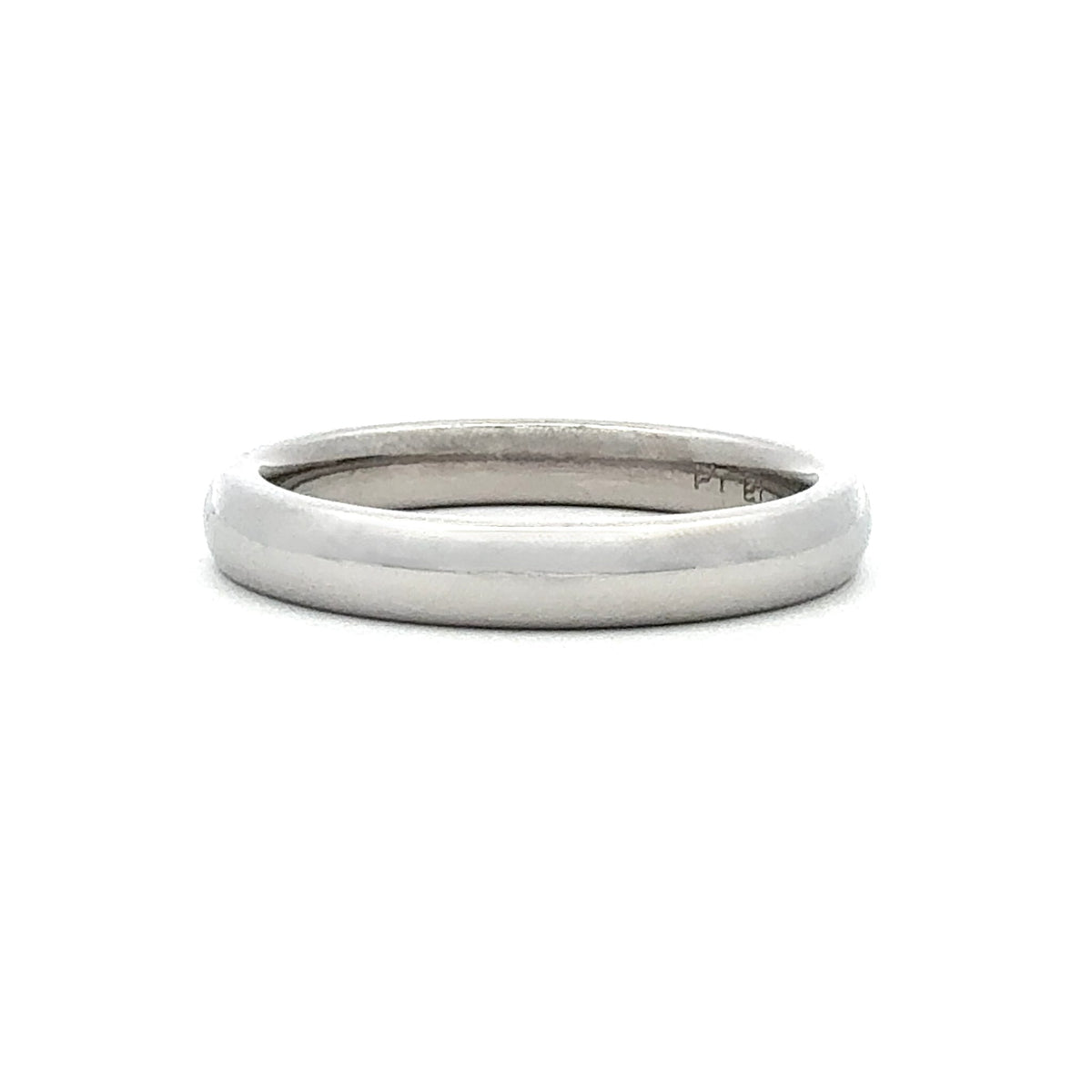 A minimalist, polished silver band ring with a subtle textured finish, shown on a clean white background.