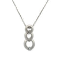 A silver pendant necklace featuring three stacked, interlocking open rings with small clear gemstones set in each ring, suspended from a delicate silver chain against a plain white background.