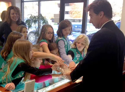 Moses Jewelers hosting a Girl Scouts visit, October 2015