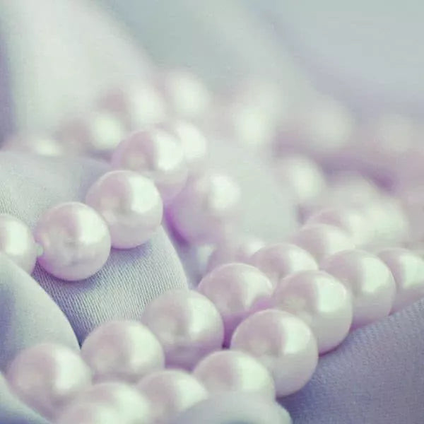 Pearl facts guide card — Moses Jewelers education